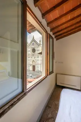 Letto o letti in una camera di Piazza Santa Croce