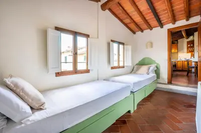 Letto o letti in una camera di Piazza Santa Croce