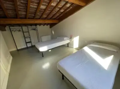 Letto o letti in una camera di Nice And Big Apartment Outside ZTL