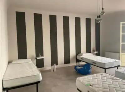 Letto o letti in una camera di Nice And Big Apartment Outside ZTL