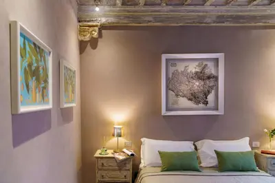Letto o letti in una camera di Borgo Signature Rooms