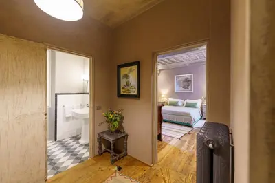 Letto o letti in una camera di Borgo Signature Rooms