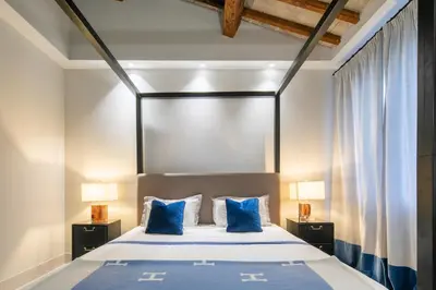 Letto o letti in una camera di Firenze F1