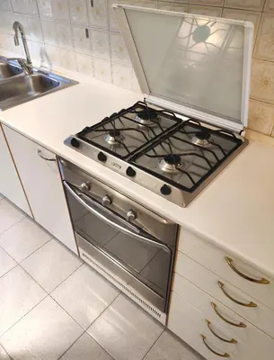 Cucina o angolo cottura di MAISON VEZZANI - Careggi - 2 terrazze private, parcheggio