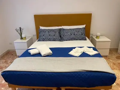 Letto o letti in una camera di Romeo’s apartment a Firenze