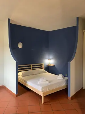 Letto o letti in una camera di Nice Studio Outside ZTL