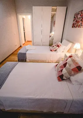 Letto o letti in una camera di Acacia Firenze - Cocco