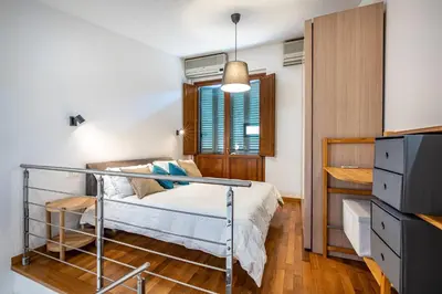 Letto o letti in una camera di YID Oltrarno segreto
