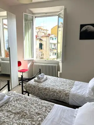 Letto o letti in una camera di Residenza La Libertà