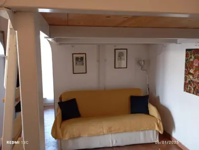 Letto o letti in una camera di Casa Irma Confortevole appartamento nel cetro di prato