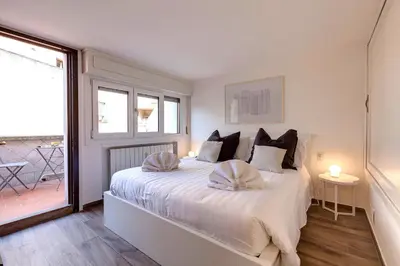 Letto o letti in una camera di Rachel Apartment by Mamo Florence
