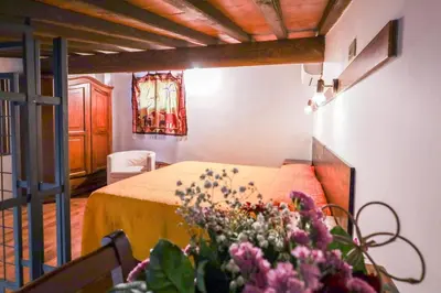 Letto o letti in una camera di Agriturismo Michelangelo