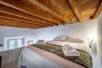 Letto o letti in una camera di YID Masaccio
