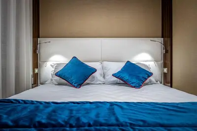 Letto o letti in una camera di YiD Santa Maria Novella Suites apt with balcony