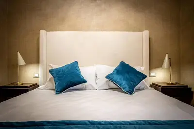 Letto o letti in una camera di YiD Santa Maria Novella Suites apt with balcony