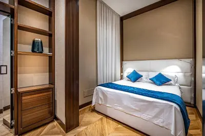 Letto o letti in una camera di YiD Santa Maria Novella Suites apt with balcony