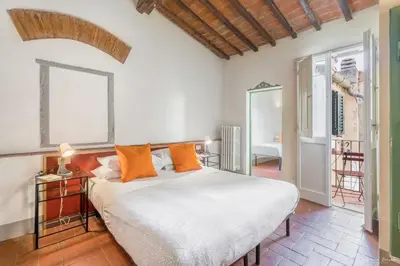 Letto o letti in una camera di Wine Apartments Florence Lambrusco