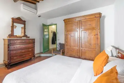 Letto o letti in una camera di Wine Apartments Florence Lambrusco