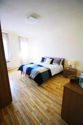 Letto o letti in una camera di HomEdoApartments La terrazza su San Lorenzo