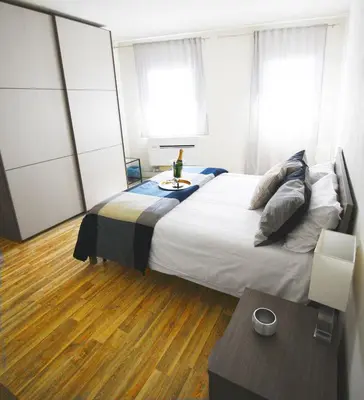 Letto o letti in una camera di HomEdoApartments La terrazza su San Lorenzo