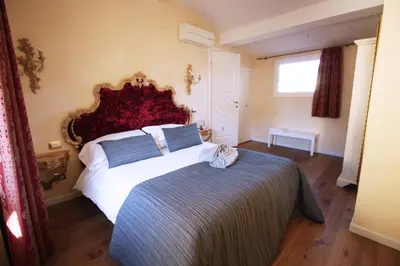 Letto o letti in una camera di HomEdoApartments Deluxe Terme suite