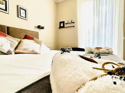 Letto o letti in una camera di Lucentum