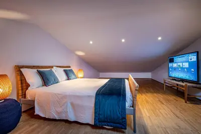 Letto o letti in una camera di YiD Penthouse on Florence River with parking