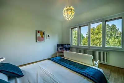 Letto o letti in una camera di YiD Penthouse on Florence River with parking