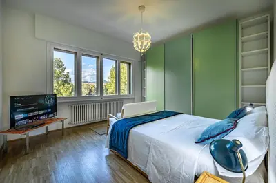 Letto o letti in una camera di YiD Penthouse on Florence River with parking