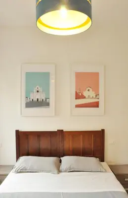Letto o letti in una camera di CHARMING APARTMENT MICHELANGELO