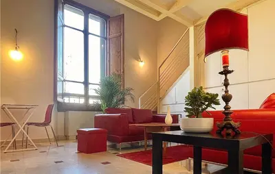 Area soggiorno di 1 Bedroom Beautiful Apartment In Firenze