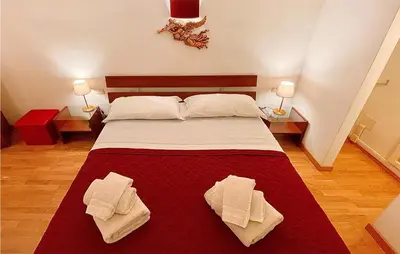 Letto o letti in una camera di 1 Bedroom Beautiful Apartment In Firenze