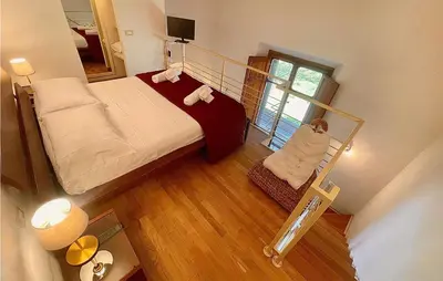 Letto o letti in una camera di 1 Bedroom Beautiful Apartment In Firenze