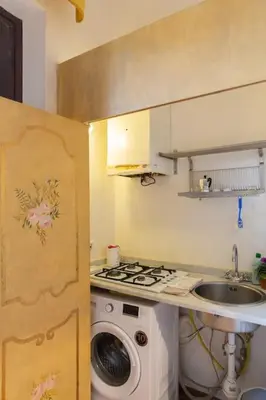 Cucina o angolo cottura di Elegant Apartment Outside ZTL & 10min from Center