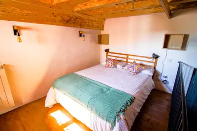 Letto o letti in una camera di Palazzo Leopardi