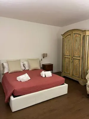 Letto o letti in una camera di Ricasoli al Quattro