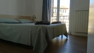 Letto o letti in una camera di Casa Viesseux