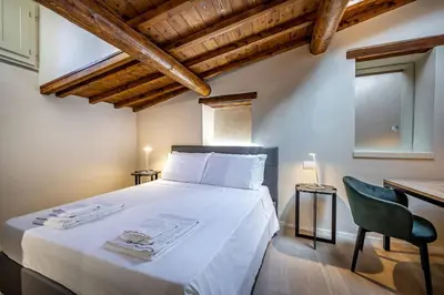 Letto o letti in una camera di YiD Lovely Duomo suite Apt