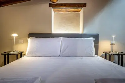 Letto o letti in una camera di YiD Lovely Duomo suite Apt