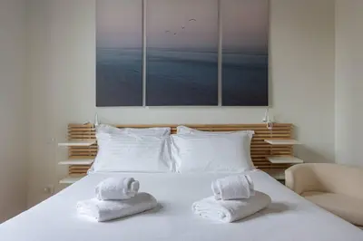 Letto o letti in una camera di Borgo Pinti's Duplex Apartment