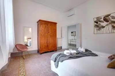 Letto o letti in una camera di Magenta Apartment by Mamo Florence