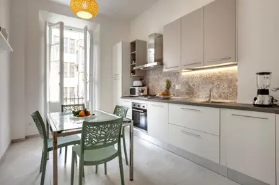 Cucina o angolo cottura di Magenta Apartment by Mamo Florence