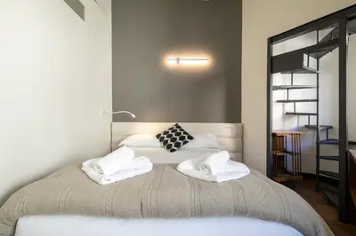 Letto o letti in una camera di Sole Apartment