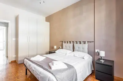 Letto o letti in una camera di GuestHost - Florence Modern & Bright Apartment!