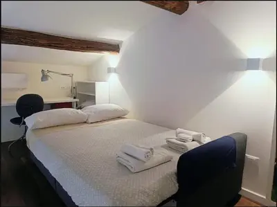 Letto o letti in una camera di Suite 59