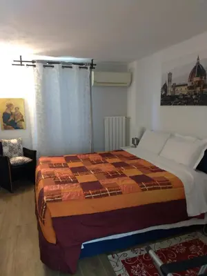 Letto o letti in una camera di Poggio Gherardo
