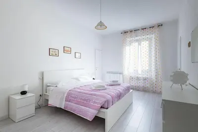 Letto o letti in una camera di GuestHost - Florence Quiet and Modern Apartments
