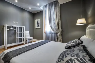 Letto o letti in una camera di YiD Capo di Mondo Luxury apartment in florence