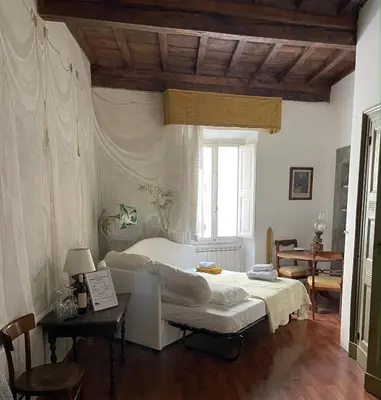 Letto o letti in una camera di Residenza dei Medici Palace Matilde