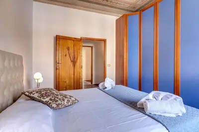 Letto o letti in una camera di Pisana Apartment by Mamo Florence